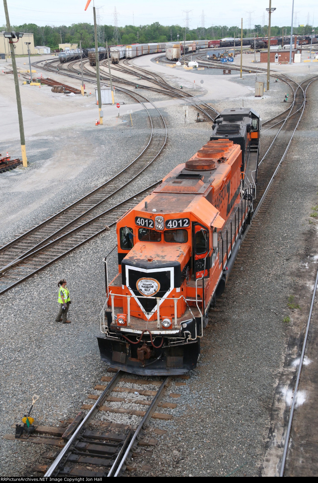 The conductor waits as 4012 & 3802 pull ahead to clear the switch